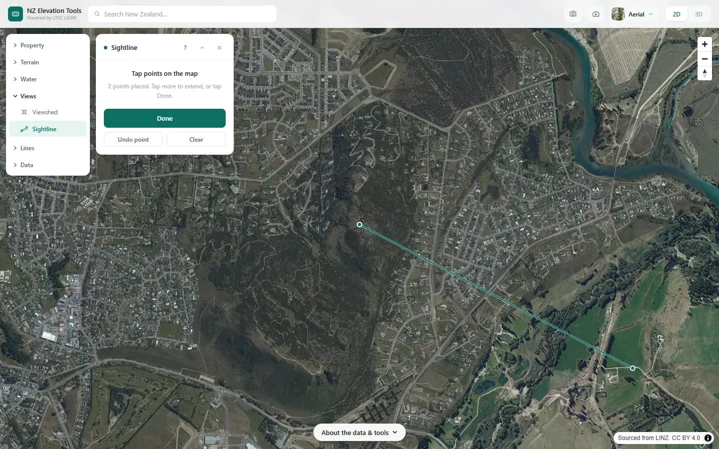 Two points joined by a line across Mt Iron and the town